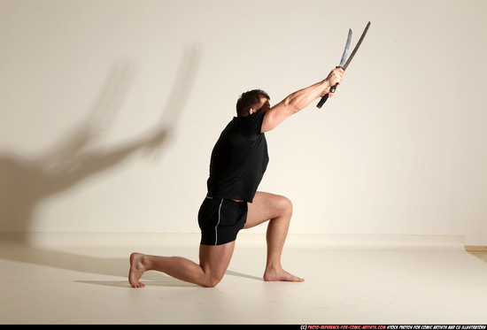 Man Adult Muscular White Fighting with sword Moving poses Sportswear