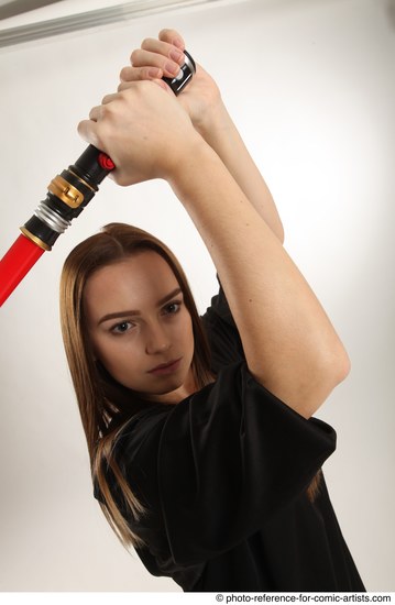 Woman Adult Average White Fighting with sword Standing poses Casual