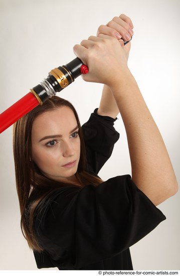 Woman Adult Average White Fighting with sword Standing poses Casual