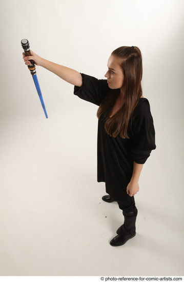 Woman Adult Average White Fighting with sword Standing poses Coat