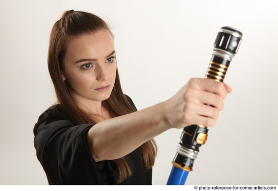 Woman Adult Average White Fighting with sword Standing poses Coat