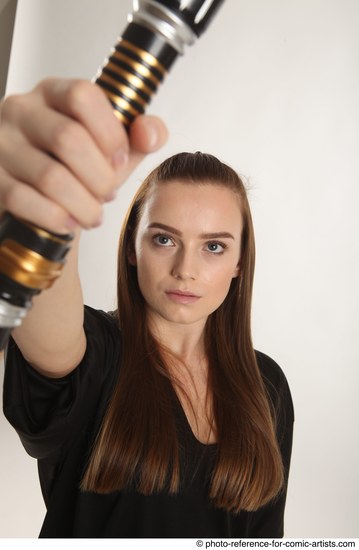 Woman Adult Average White Fighting with sword Standing poses Coat