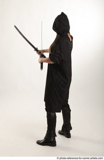 Woman Adult Average White Fighting with sword Standing poses Coat