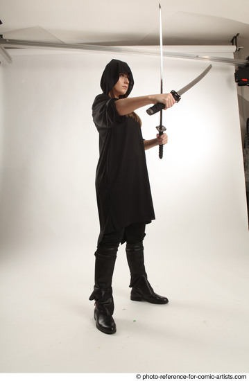 Woman Adult Average White Fighting with sword Standing poses Coat