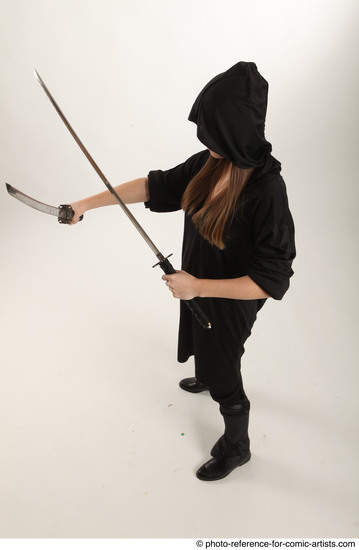 Woman Adult Average White Fighting with sword Standing poses Coat