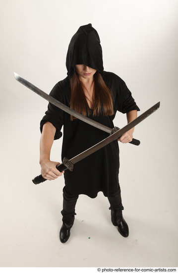 Woman Adult Average White Fighting with sword Standing poses Coat