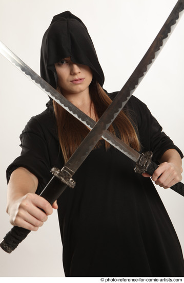 Woman Adult Average White Fighting with sword Standing poses Coat