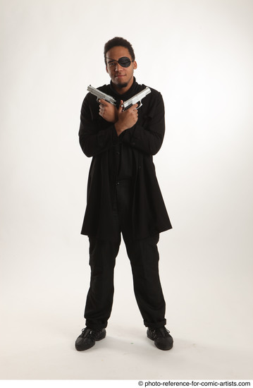 Man Adult Average Black Fighting with gun Standing poses Coat