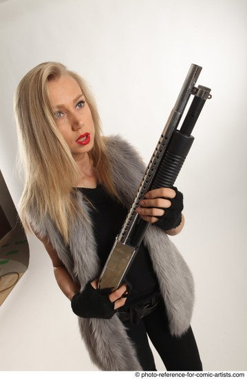 Woman Adult Average White Fighting with gun Standing poses Coat