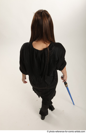 Woman Adult Average White Fighting with sword Standing poses Coat