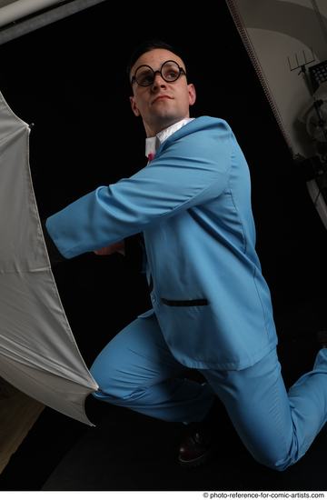 Man Adult Muscular White Fighting without gun Kneeling poses Business