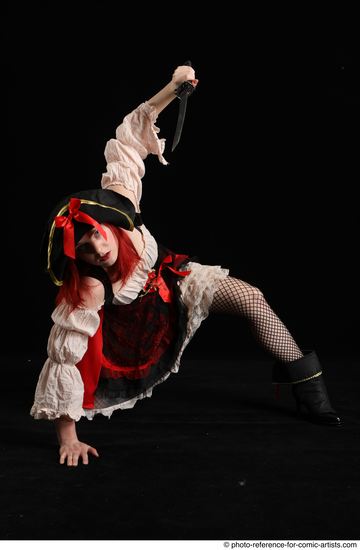 Woman Adult Average White Fighting with knife Kneeling poses Casual