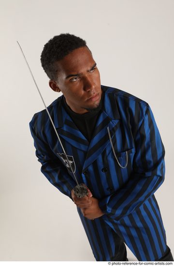 Man Adult Average Black Fighting with sword Standing poses Coat