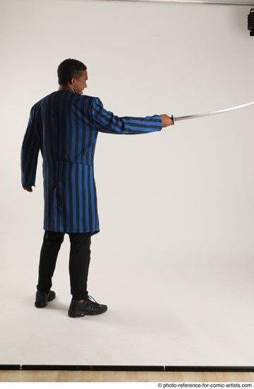 Man Adult Average Black Fighting with sword Standing poses Casual