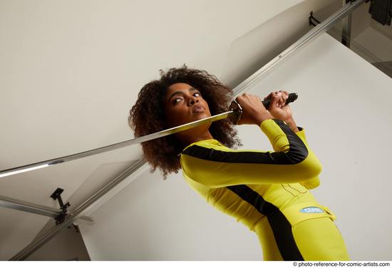 Woman Adult Average Black Fighting with sword Standing poses Casual