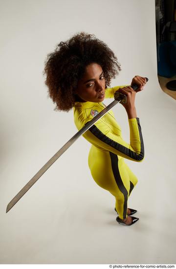 Woman Adult Average Black Fighting with sword Standing poses Casual