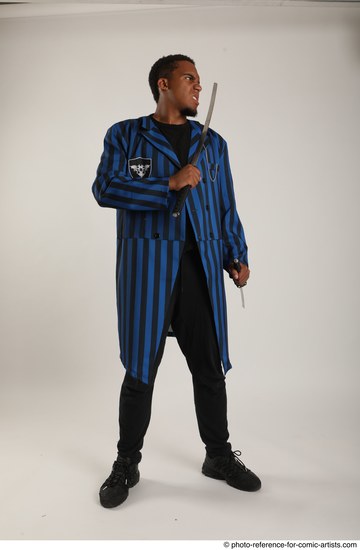 Man Adult Average Black Fighting with sword Standing poses Casual