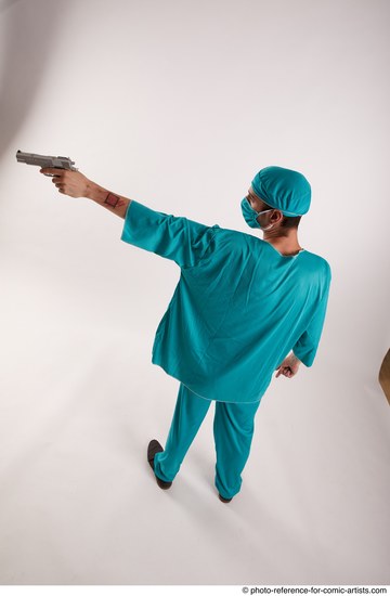 Man Adult Average White Fighting with gun Standing poses Casual