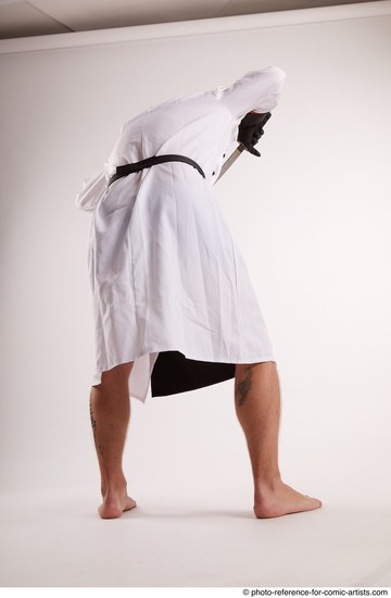 Man Adult Average White Fighting with knife Standing poses Casual