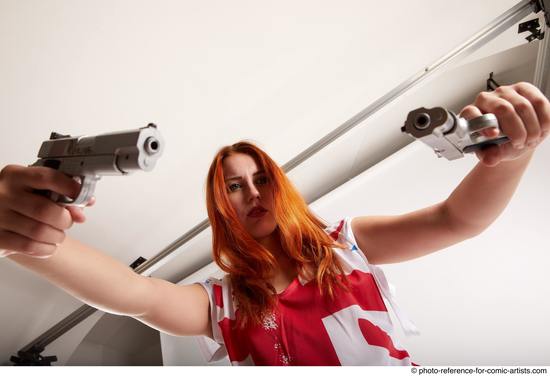 Woman Adult Average White Fighting with gun Standing poses Casual