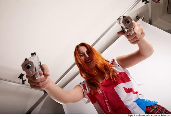 Woman Adult Average White Fighting with gun Standing poses Casual