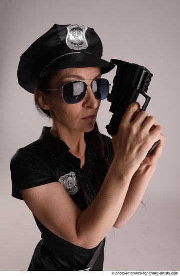 Woman Adult Average White Fighting with gun Standing poses Casual