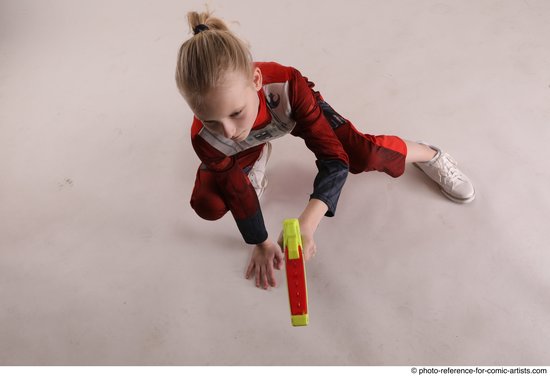 Woman Young Athletic White Fighting with gun Sitting poses Army