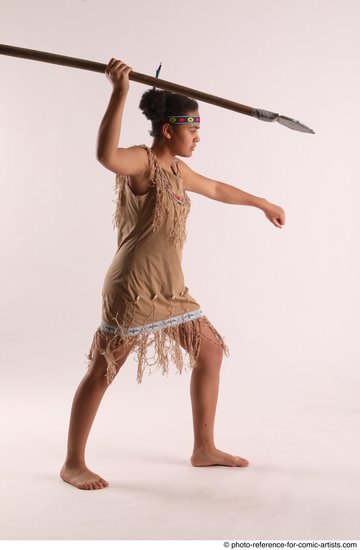 Woman Young Average Black Fighting with spear Standing poses Casual