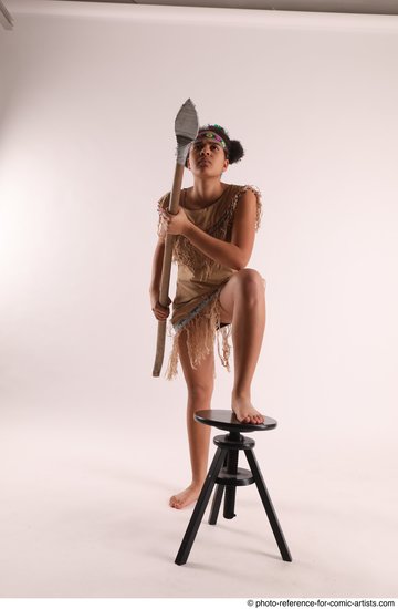 Woman Young Average Black Fighting with spear Standing poses Casual