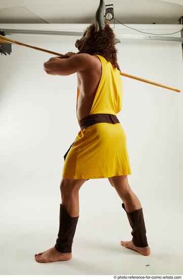 Man Adult Average White Fighting with spear Standing poses Casual