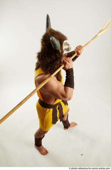 Man Adult Average White Fighting with spear Standing poses Casual