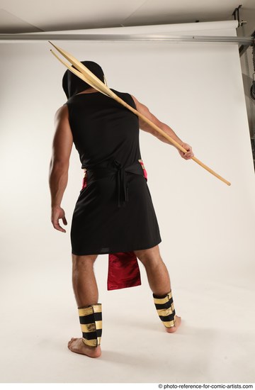 Man Adult Muscular Fighting with spear Standing poses Casual Latino