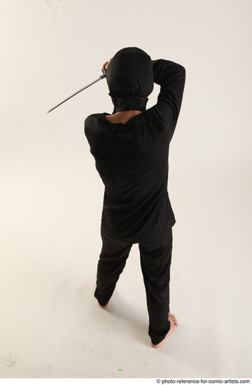 Man Young Athletic White Fighting with knife Standing poses Casual