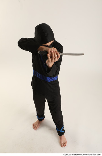 Man Young Athletic White Fighting with knife Standing poses Casual