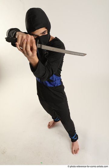 Man Young Athletic White Fighting with knife Standing poses Casual