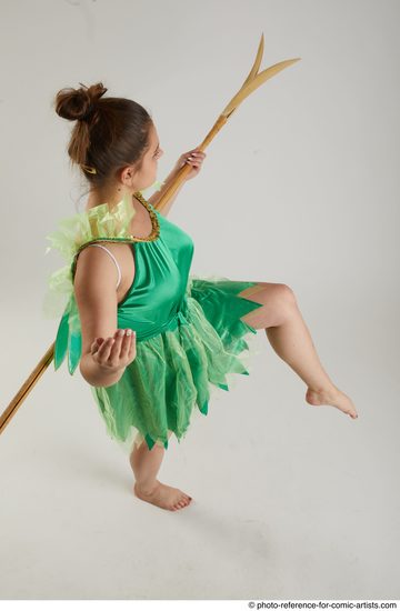 Woman Adult Average White Fighting with spear Standing poses Casual