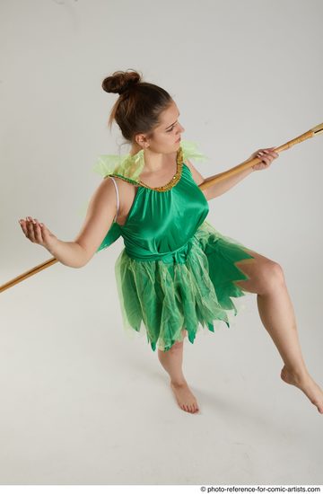 Woman Adult Average White Fighting with spear Standing poses Casual