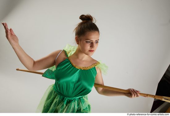 Woman Adult Average White Fighting with spear Standing poses Casual