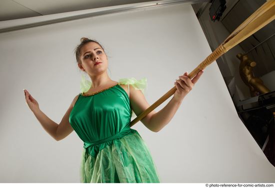 Woman Adult Average White Fighting with spear Standing poses Casual