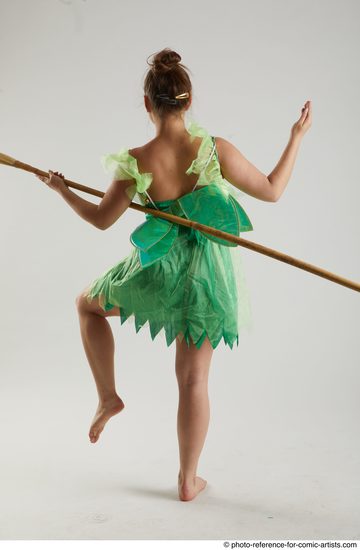 Woman Adult Average White Fighting with spear Standing poses Casual