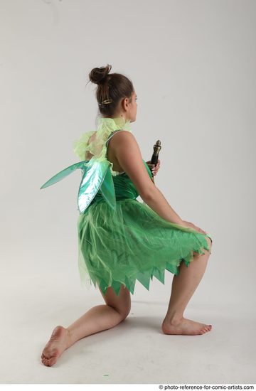 Woman Adult Average White Fighting with sword Kneeling poses Casual