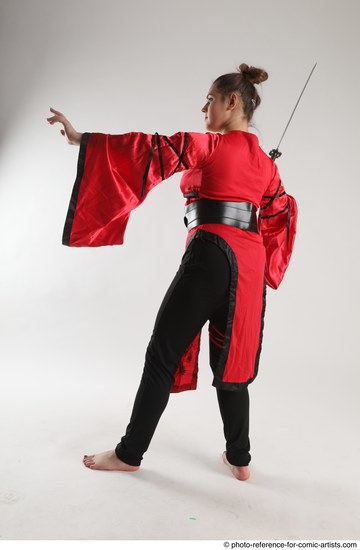 Woman Adult Average Martial art Standing poses Casual Latino