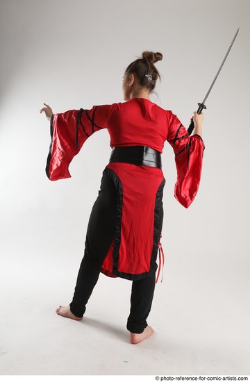 Woman Adult Average Martial art Standing poses Casual Latino