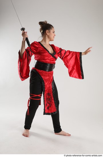 Woman Adult Average Martial art Standing poses Casual Latino