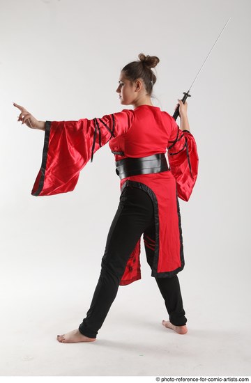 Woman Adult Average Martial art Standing poses Casual Latino