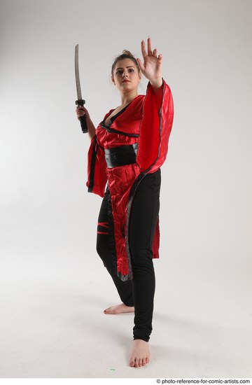 Woman Adult Average Martial art Standing poses Casual Latino