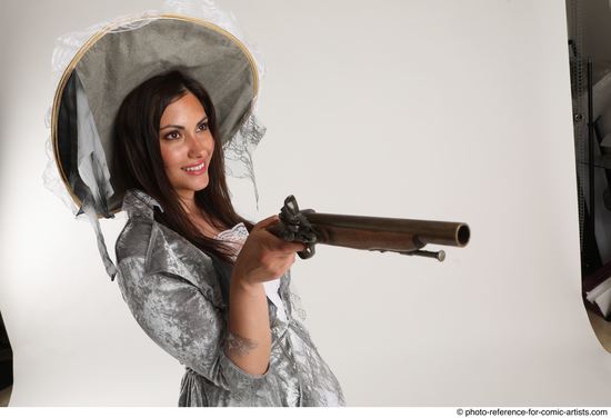 Woman Adult Average White Fighting with gun Standing poses Coat