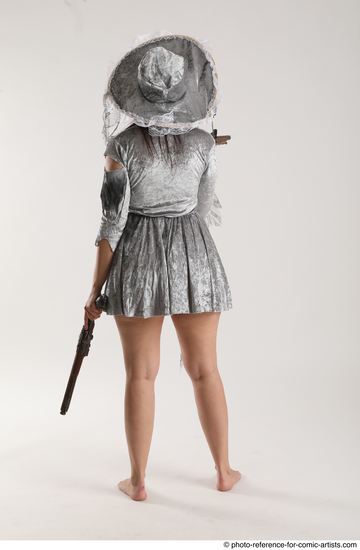 Woman Adult Average White Fighting with gun Standing poses Coat