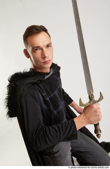 Man Adult Athletic White Fighting with sword Kneeling poses Coat