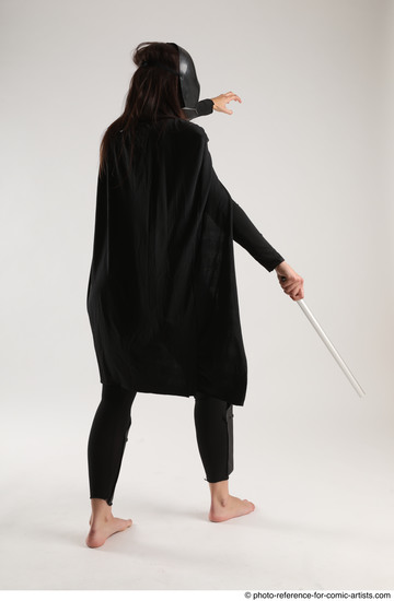 Woman Adult Average White Fighting with sword Standing poses Coat